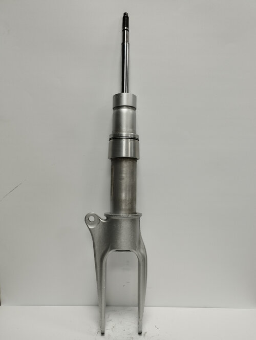 Передній амортизатор